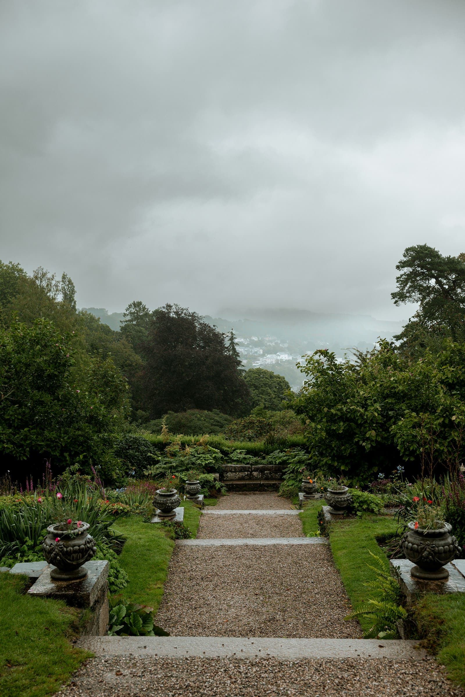 Landscaped garden with a gravel path and shrubs